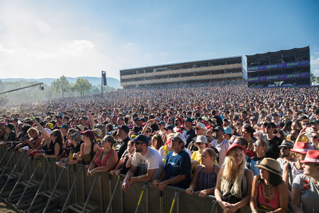 Nyon, Switzerland - 23 July 2019: Audience crowd cheering in front of concert of Canadian rock band from Quebec Les Cowboys Fringants at Paleo Festivalのeditorial素材