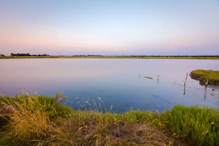 Panoramic view of the salt marshland at sunrise, Olonne area, Vendee, Franceの写真素材