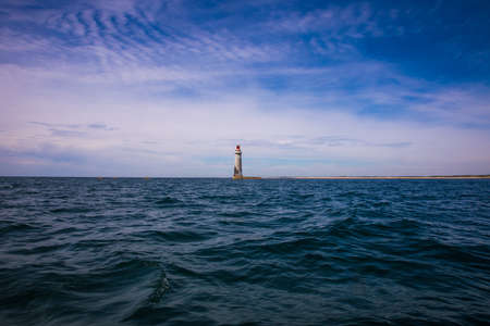 Phare des Barges - Lighthouse "des Barges" offshore the harbour of les sables d'Olonne, Vendee, Franceの写真素材