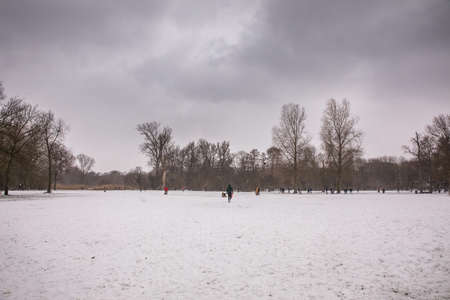 winter view of the white Vondelpark under the snow in Amsterdamの写真素材