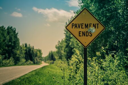 Pavement Ends Sign on Rural Roadの写真素材