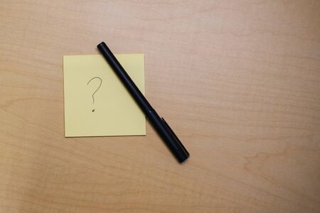 Question Mark Note on Desk