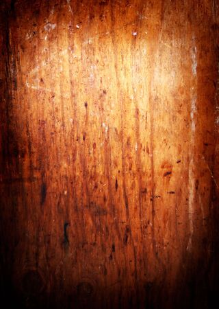 Grungy background from a burnt wooden boardの写真素材