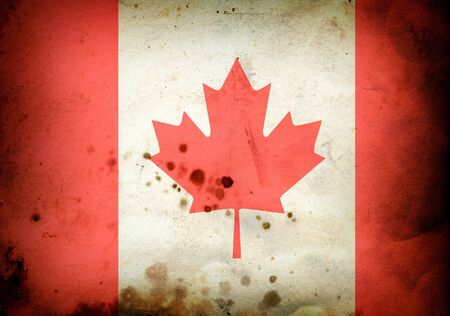 Flag of Canada on a burned old paperの写真素材