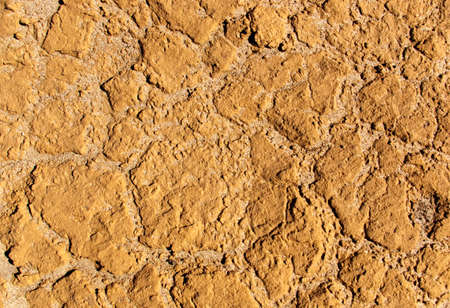 Close-up of the dried up surface of clayの写真素材