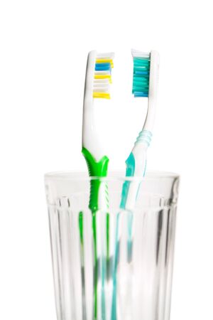 Toothbrushes in transparent glassの写真素材