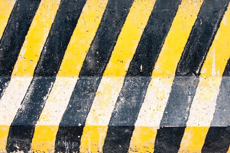 Asphalt Background with yellow and black stripeの写真素材
