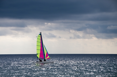 Sailing ship at sea on a cloudy dayの写真素材