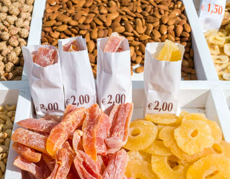 Shop window in which the nuts are sold in packagesの写真素材