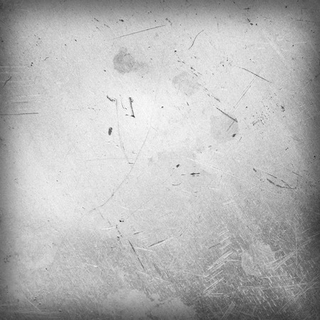 Scratched and spotted a metal sheetの写真素材