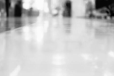 Beautiful background from blurred lights of interior. Grayscale image