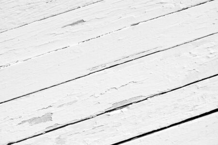 Grunge background of weathered painted wooden plankの写真素材