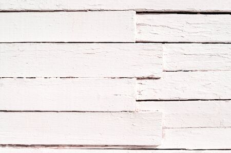 Grunge background of weathered painted wooden plankの写真素材