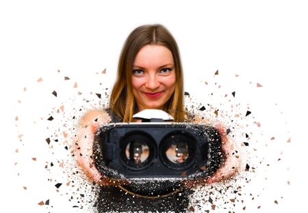 Happy young woman with a virtual reality headsetの写真素材