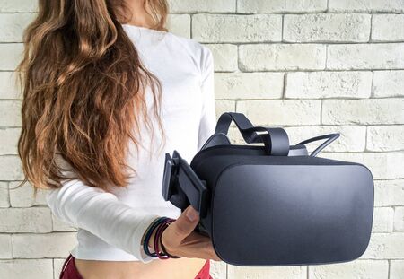 Woman with virtual reality goggles