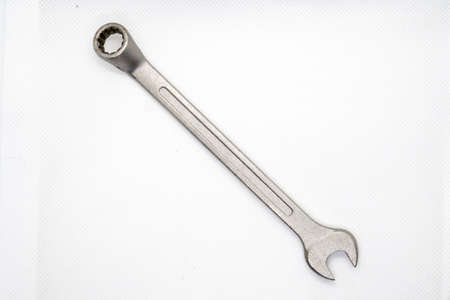 combination wrench close up view over a white background