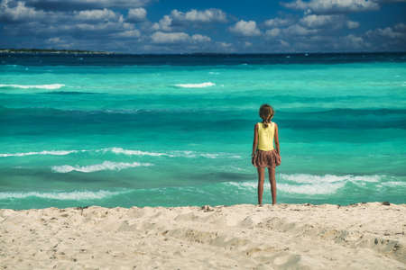 little girl enjoying the view at a cuban beachのeditorial素材