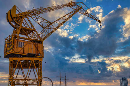 Old colorful cargo cranes located in Puerto Madero, Buenos Aires city, Argentinaの写真素材
