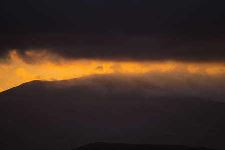 Low clouds mixed with the mountains at sunset in Sierra de la ventana