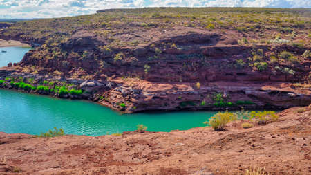 El chocon landscape, Neuquen province, Argentina. Taken on a warm summer day from the shoreの写真素材