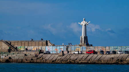Large San Salvador white statue at the end of Mar del plata fishing portのeditorial素材