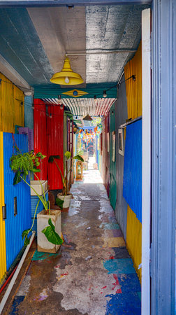 colorful old corridor between houses in La Boca, Buenos Airesの写真素材