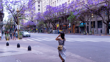Young woman walking the streets of colorful Buenos Aires