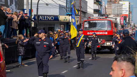 Firefighters marching at volunteer firefighters day paradeのeditorial素材