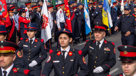 Close view of a fire woman marching in a volunteer firefighters day parade.のeditorial素材