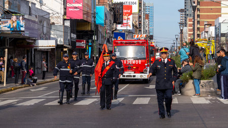 Firefighters marching at volunteer firefighters day paradeのeditorial素材