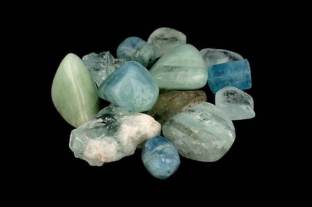Aquamarine (from Latin: aqua marina, "sea water") is a blue or cyan variety of beryl. It occurs at most localities which yield ordinary beryl.の写真素材