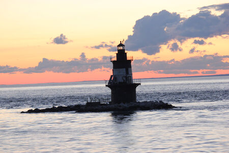this is a photo of a lighthouse in long island soundの写真素材