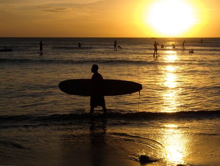 surfer in the sunsetの写真素材
