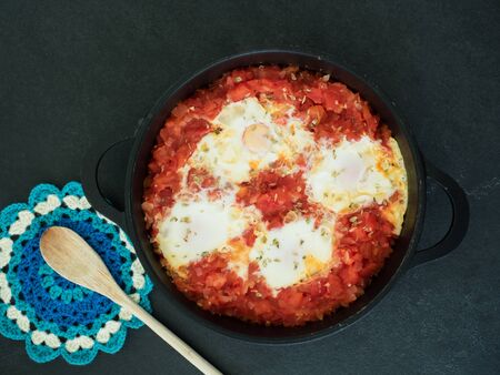 tomato and poached eggs. top viewの写真素材