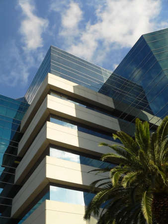 The modern and historic buildings of a downtown area in a cityの写真素材