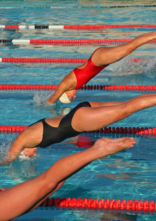 A high school swim meet and the athletes who compete for their schoolの写真素材
