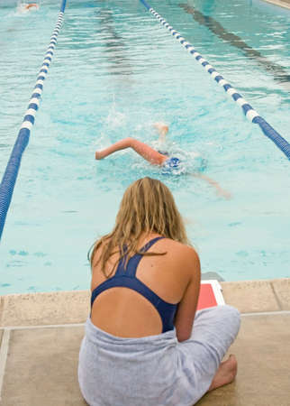 A high school swim meet for competitve athletes and spectatorsの写真素材
