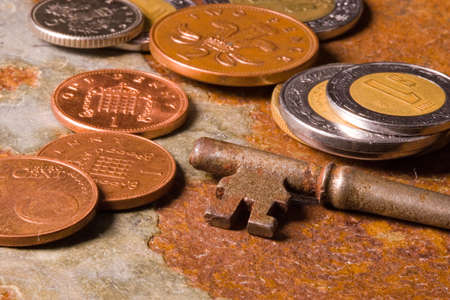 Old skeleton type keys on a solid slate stone foundationの写真素材