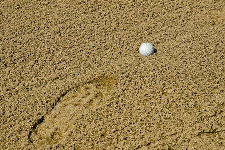 Golf course action and players hitting the greensの写真素材