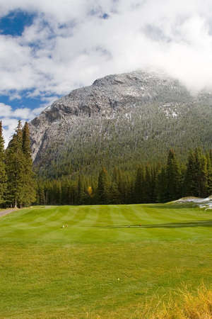 Rocky Mountain golf course on a bright autumn fall day in Canadaの写真素材