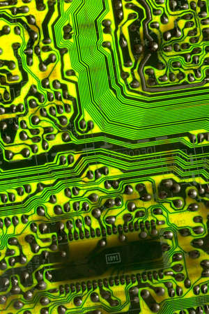 Electronic circuit board background showing wires and microchipsの写真素材