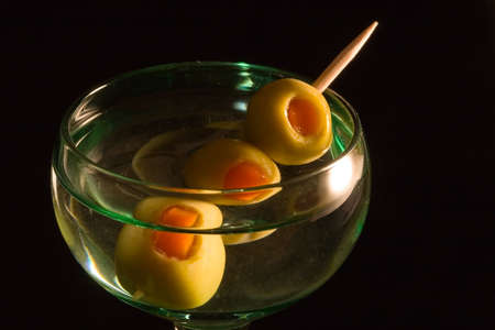 Cocktails, drinks, and alcohol in a colored glass at a barの写真素材