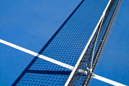 Resort tennis club and tennis courts with ballsの写真素材