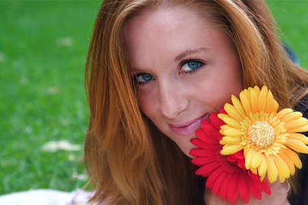 Young beautiful woman in an autumn settingの写真素材