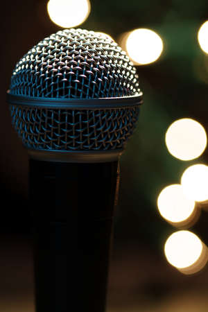 On stage microphone of a popular artist with spot lightsの写真素材