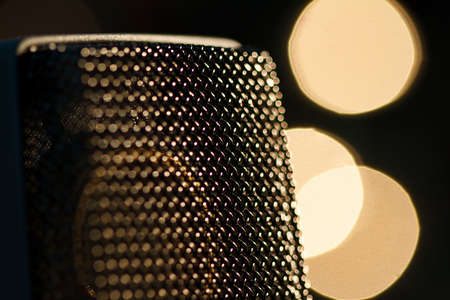 On stage microphone of a popular artist with spot lightsの写真素材