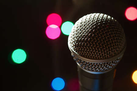 On stage microphone of a popular artist with spot lightsの写真素材
