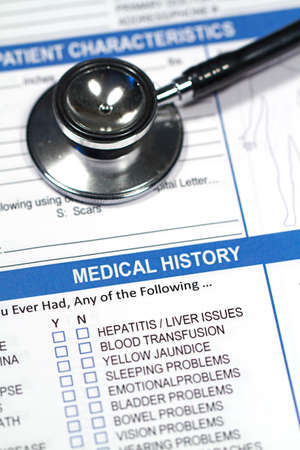 Close up of a Medical History form and a doctor's Stethoscopeの写真素材