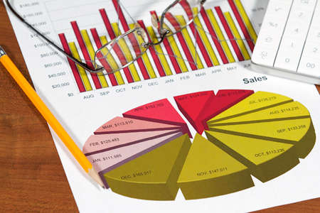 A business plan and project on the deskの写真素材