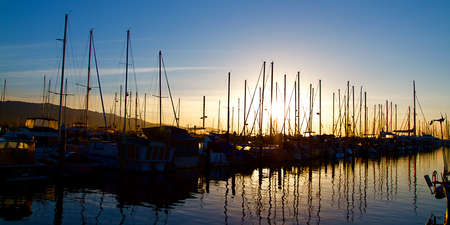 Santa Barbara Harbor with Yachts Boats at Sunrise in Silhouette